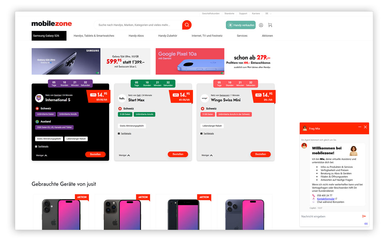 Screenshot des Online Shops von Mobilezone mit angezeigtem Chatbot „Mia“ unten rechts. Mia begrüßt Nutzer, informiert über Produkte und Tarife und bietet Kontakt zum Kundendienst.